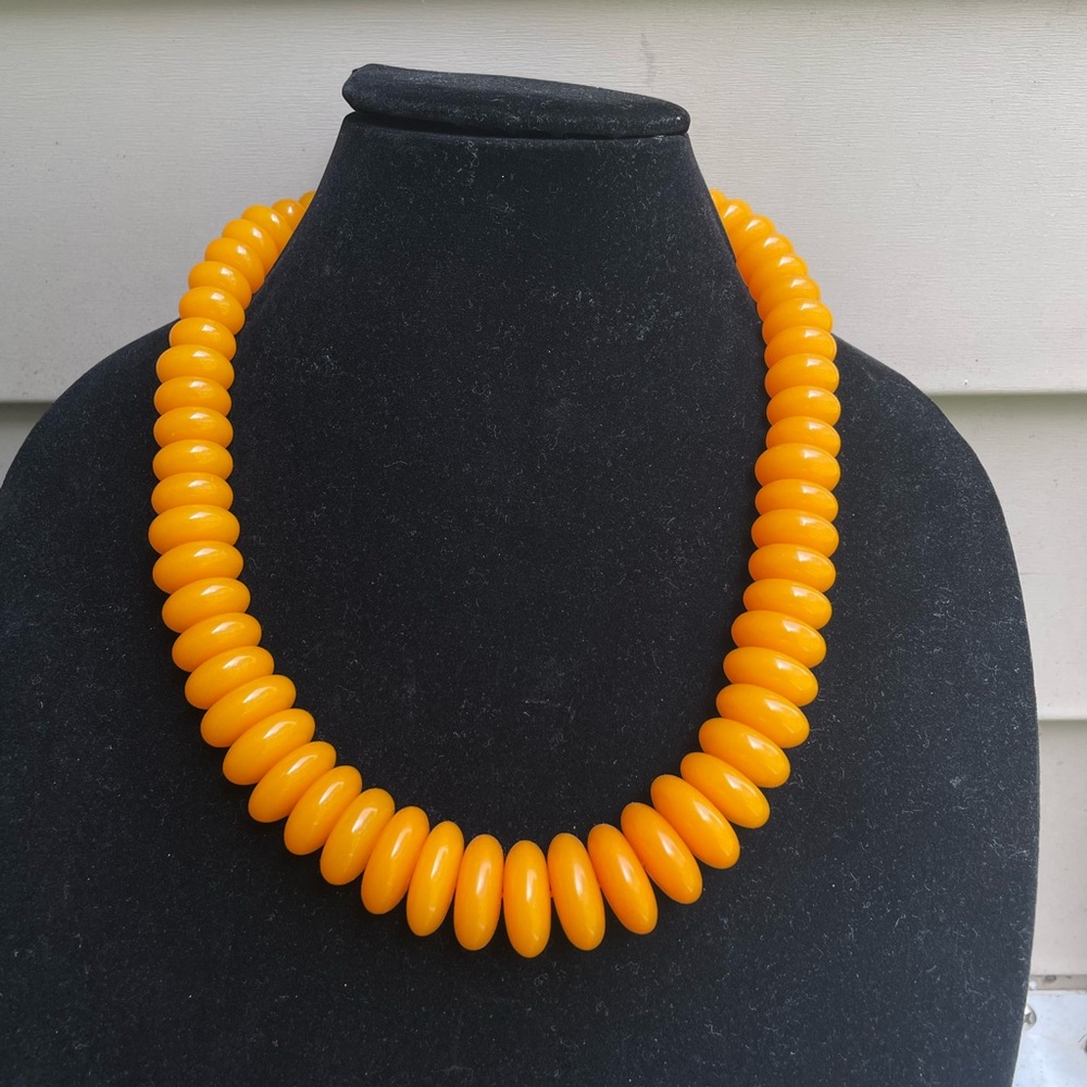 Orange Beaded Necklace with Striking Design